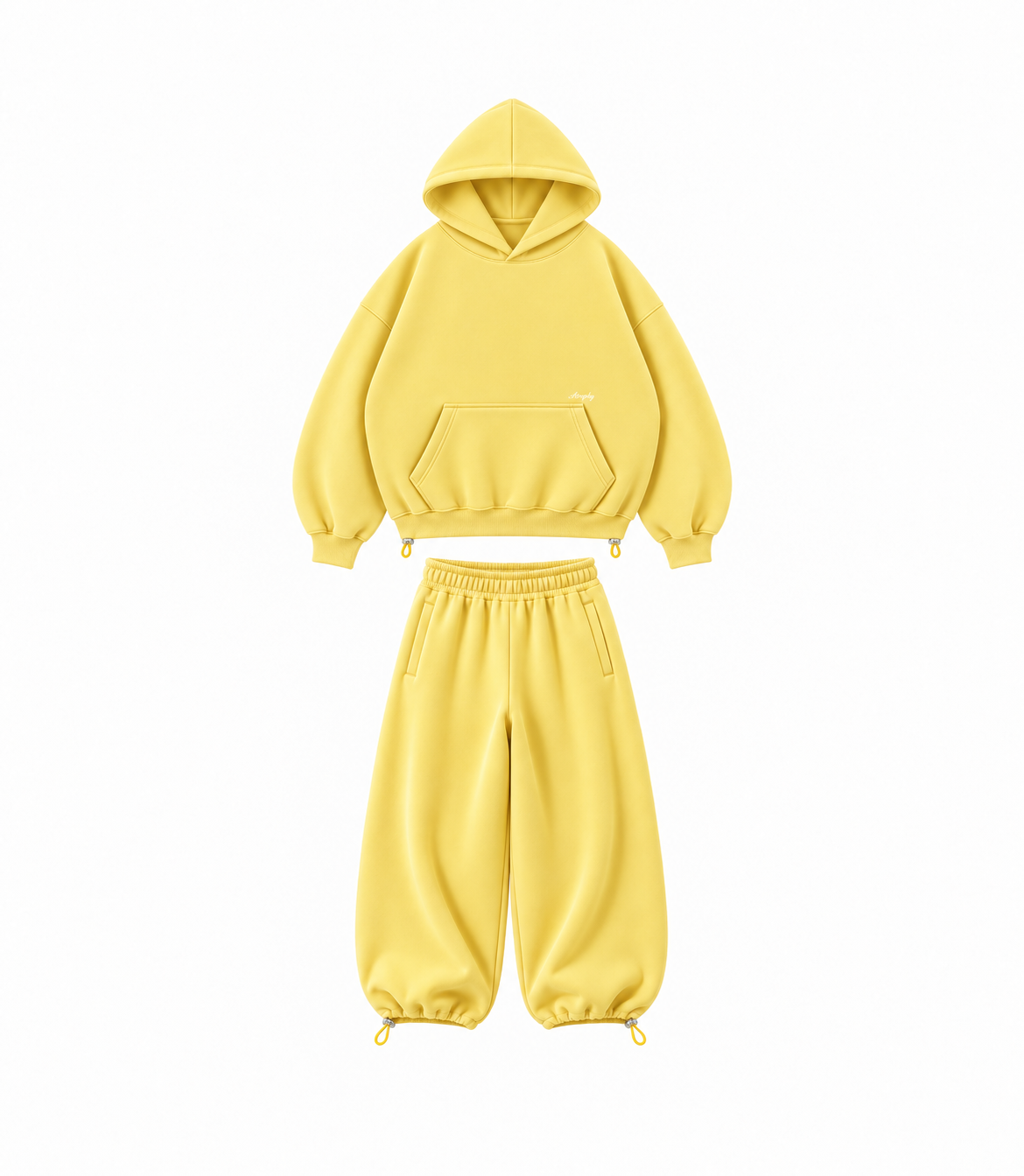 Zestaw Butter Yellow – bluza i spodnie na białym tle